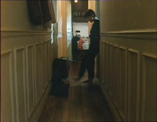 提行李箱的人剧照的剧照